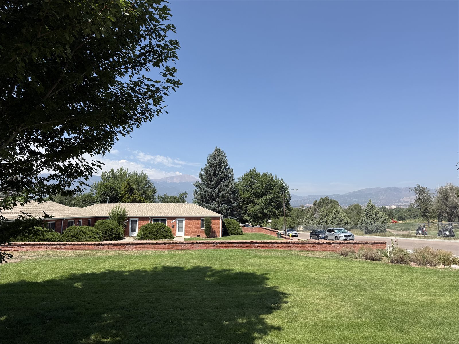 Landscaped grounds with mountain views at the Caramillo property
